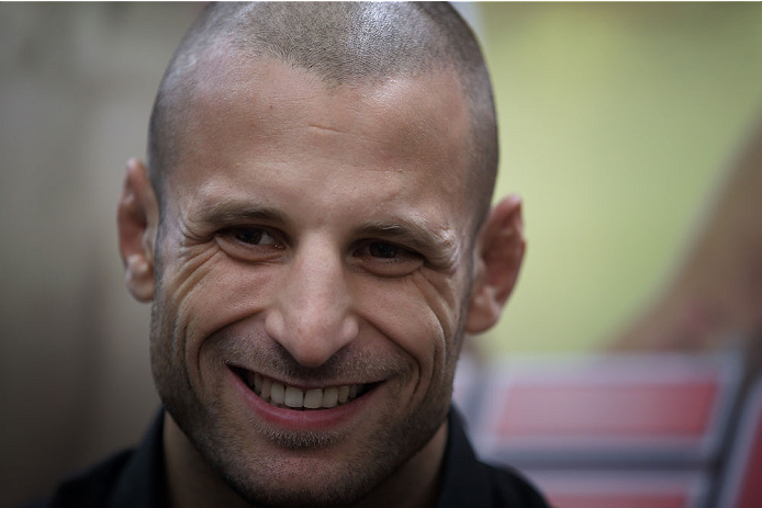 SINGAPORE - JANUARY 02: Tarec Saffiedine speaks to the media during the UFC Fight Night Singapore Ultimate Media Day at the Skating Rink at The Shoppes at Marina Bay Sand on January 2, 2014 in Singapore. (Photo by Suhaimi Abdullah/Zuffa LLC)