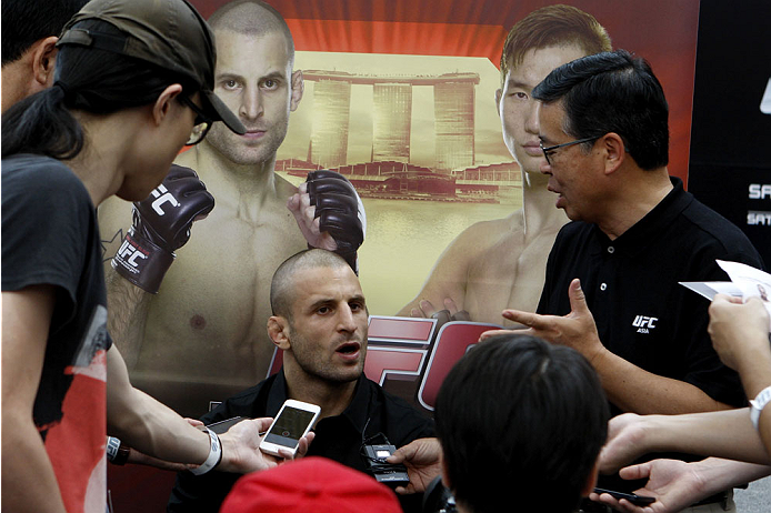 SINGAPORE - JANUARY 02: Tarec Saffiedine interacts with media during the UFC Fight Night Singapore Ultimate Media Day at the Shoppes at Marina Bay Sands on January 2, 2014 in Singapore. (Photo by Mitch Viquez/Zuffa LLC/Zuffa LLC via Getty Images)