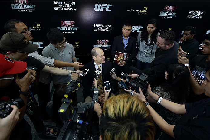 SINGAPORE - JANUARY 02: Mark Fischer, managing director of UFC Asia, speaks to the media during the UFC Fight Night Singapore Ultimate Media Day at the Skating Rink at The Shoppes at Marina Bay Sand on January 2, 2014 in Singapore. (Photo by Suhaimi Abd