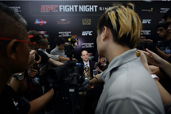 SINGAPORE - JANUARY 02: Mark Fischer, managing director of UFC Asia, speaks to the media during the UFC Fight Night Singapore Ultimate Media Day at the Skating Rink at The Shoppes at Marina Bay Sand on January 2, 2014 in Singapore. (Photo by Suhaimi Abd