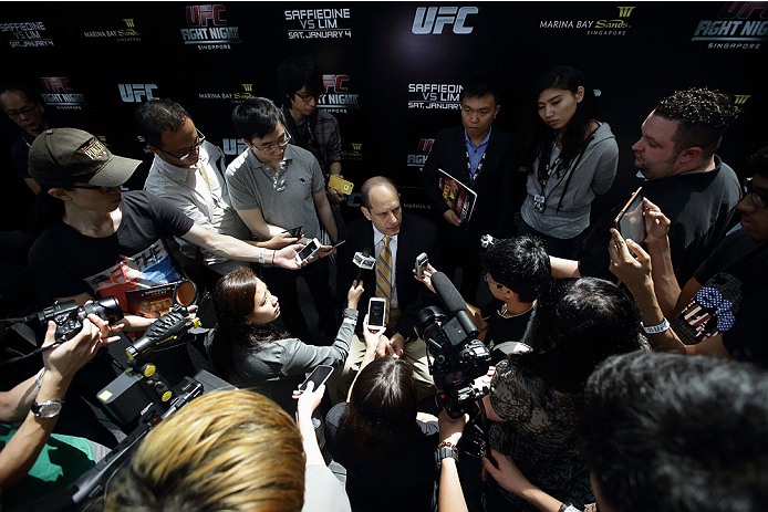 SINGAPORE - JANUARY 02: Mark Fischer, managing director of UFC Asia, speaks to the media during the UFC Fight Night Singapore Ultimate Media Day at the Skating Rink at The Shoppes at Marina Bay Sand on January 2, 2014 in Singapore. (Photo by Suhaimi Abd