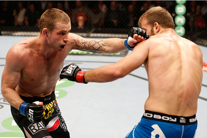STOCKHOLM, SWEDEN - OCTOBER 04: (L-R) Krzysztof Jotko of Poland punches Tor Troeng of Sweden in their middleweight bout at the Ericsson Globe Arena on October 4, 2014 in Stockholm, Sweden. (Photo by Josh Hedges/Zuffa LLC/Zuffa LLC)