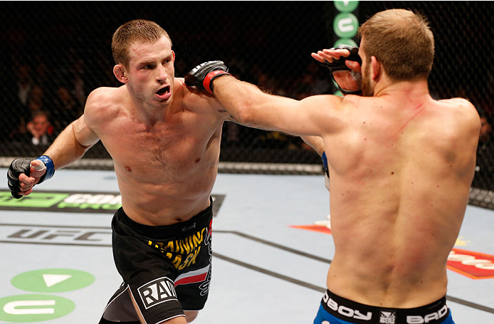 STOCKHOLM, SWEDEN - OCTOBER 04: (L-R) Krzysztof Jotko of Poland punches Tor Troeng of Sweden in their middleweight bout at the Ericsson Globe Arena on October 4, 2014 in Stockholm, Sweden. (Photo by Josh Hedges/Zuffa LLC/Zuffa LLC)
