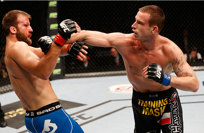 STOCKHOLM, SWEDEN - OCTOBER 04: (R-L) Krzysztof Jotko of Poland punches Tor Troeng of Sweden in their middleweight bout at the Ericsson Globe Arena on October 4, 2014 in Stockholm, Sweden. (Photo by Josh Hedges/Zuffa LLC/Zuffa LLC)
