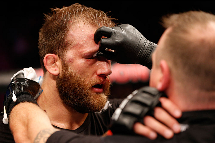 STOCKHOLM, SWEDEN - OCTOBER 04: Tor Troeng of Sweden is treated by his cut man after his three-round middleweight bout against Krzysztof Jotko of Poland at the Ericsson Globe Arena on October 4, 2014 in Stockholm, Sweden. (Photo by Josh Hedges/Zuffa LLC