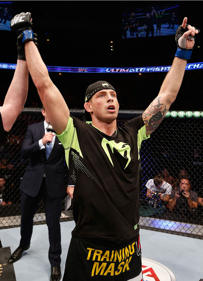 STOCKHOLM, SWEDEN - OCTOBER 04: Krzysztof Jotko of Poland celebrates after his unanimous-decision victory over Tor Troeng of Sweden in their middleweight bout at the Ericsson Globe Arena on October 4, 2014 in Stockholm, Sweden. (Photo by Josh Hedges/Zuf