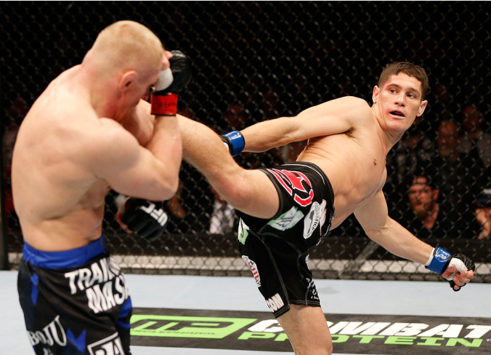 STOCKHOLM, SWEDEN - OCTOBER 04: (R-L) Charles Rosa kicks Dennis Siver of Germany in their featherweight bout at the Ericsson Globe Arena on October 4, 2014 in Stockholm, Sweden. (Photo by Josh Hedges/Zuffa LLC/Zuffa LLC)