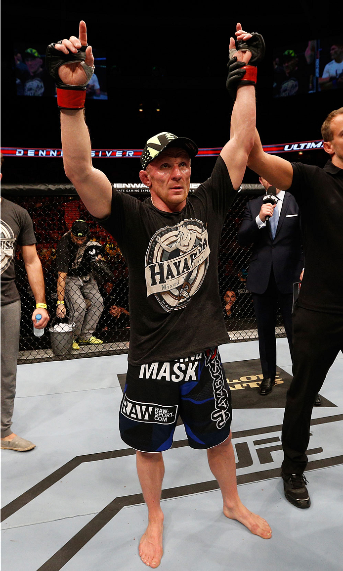 STOCKHOLM, SWEDEN - OCTOBER 04: Dennis Siver of Germany celebrates after his decision victory over Charles Rosa in their featherweight bout at the Ericsson Globe Arena on October 4, 2014 in Stockholm, Sweden. (Photo by Josh Hedges/Zuffa LLC/Zuffa LLC)