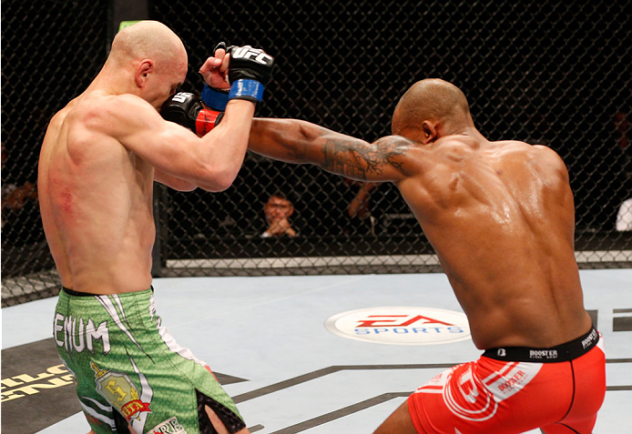 STOCKHOLM, SWEDEN - OCTOBER 04: (R-L) Nico Musoke of Sweden punches Alexander Yakovlev of Russia in their welterweight bout at the Ericsson Globe Arena on October 4, 2014 in Stockholm, Sweden. (Photo by Josh Hedges/Zuffa LLC/Zuffa LLC)