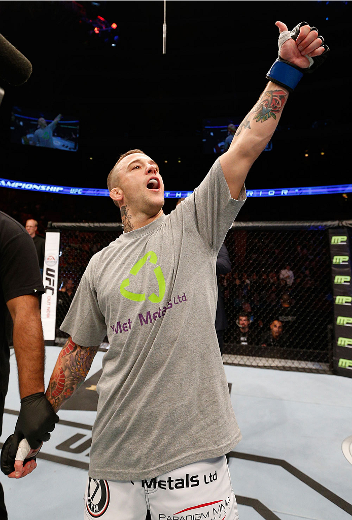 STOCKHOLM, SWEDEN - OCTOBER 04: Mike Wilkinson of England celebrates after his knockout victory over Niklas Backstrom of Sweden in their featherweight bout at the Ericsson Globe Arena on October 4, 2014 in Stockholm, Sweden. (Photo by Josh Hedges/Zuffa