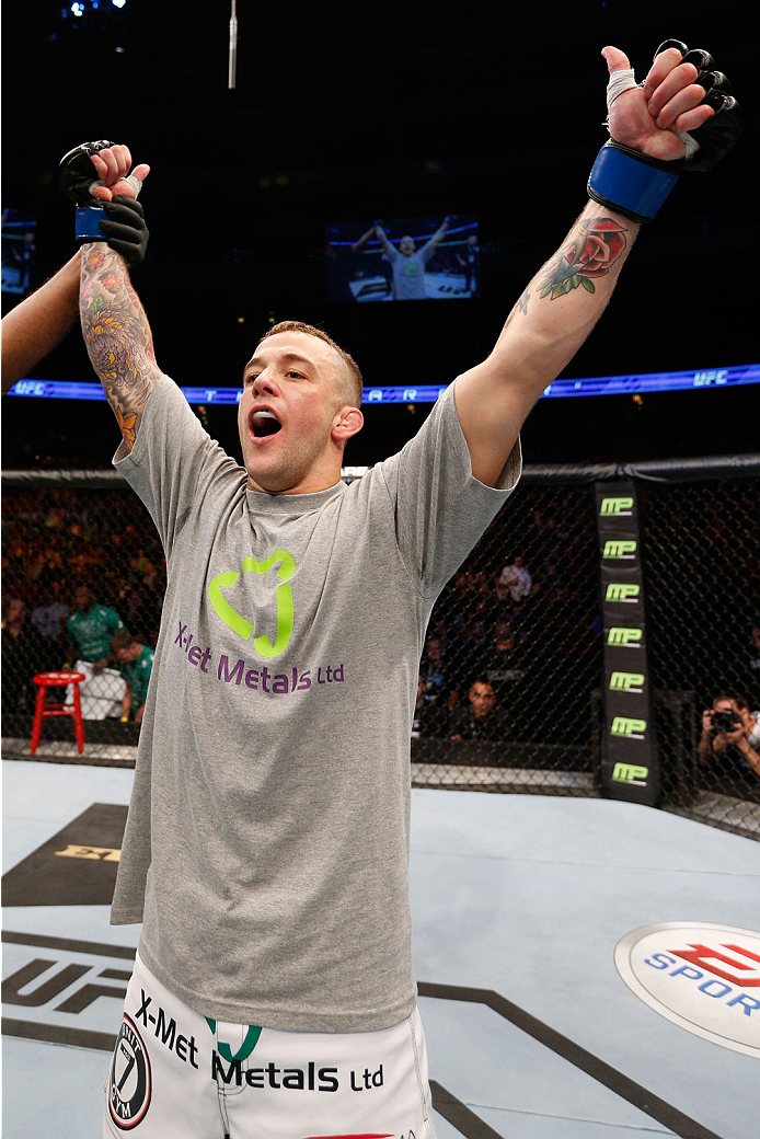 STOCKHOLM, SWEDEN - OCTOBER 04: Mike Wilkinson of England celebrates after his knockout victory over Niklas Backstrom of Sweden in their featherweight bout at the Ericsson Globe Arena on October 4, 2014 in Stockholm, Sweden. (Photo by Josh Hedges/Zuffa