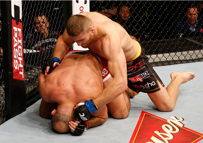 STOCKHOLM, SWEDEN - OCTOBER 04: (R-L) Jan Blachowicz of Poland punches Ilir Latifi of Sweden in their light heavyweight bout at the Ericsson Globe Arena on October 4, 2014 in Stockholm, Sweden. (Photo by Josh Hedges/Zuffa LLC/Zuffa LLC)