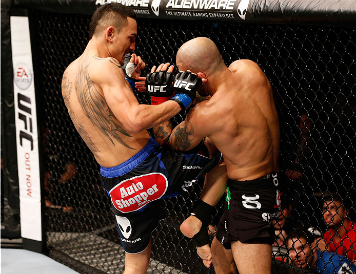 STOCKHOLM, SWEDEN - OCTOBER 04: (L-R) Max Holloway knees Akira Corassani of Sweden in their featherweight bout at the Ericsson Globe Arena on October 4, 2014 in Stockholm, Sweden. (Photo by Josh Hedges/Zuffa LLC/Zuffa LLC)