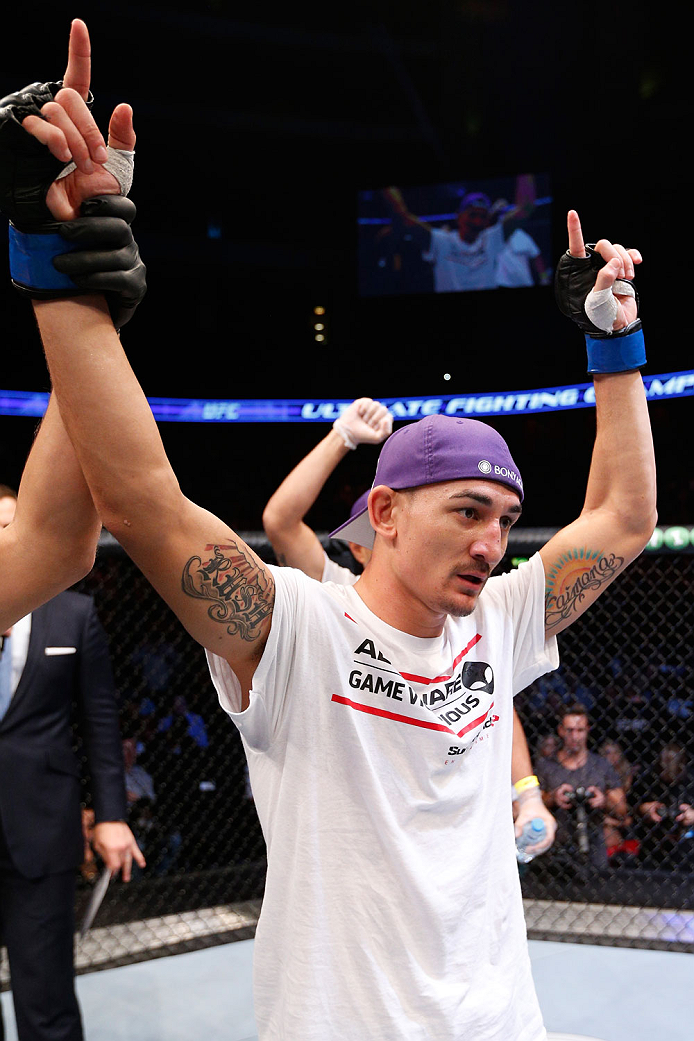 STOCKHOLM, SWEDEN - OCTOBER 04: Max Holloway celebrates after his TKO victory over Akira Corassani of Sweden in their featherweight bout at the Ericsson Globe Arena on October 4, 2014 in Stockholm, Sweden. (Photo by Josh Hedges/Zuffa LLC/Zuffa LLC)