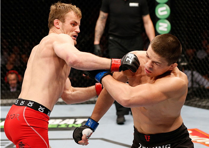 STOCKHOLM, SWEDEN - OCTOBER 04: (L-R) Gunnar Nelson of Iceland punches Rick Story in their welterweight bout at the Ericsson Globe Arena on October 4, 2014 in Stockholm, Sweden. (Photo by Josh Hedges/Zuffa LLC/Zuffa LLC)