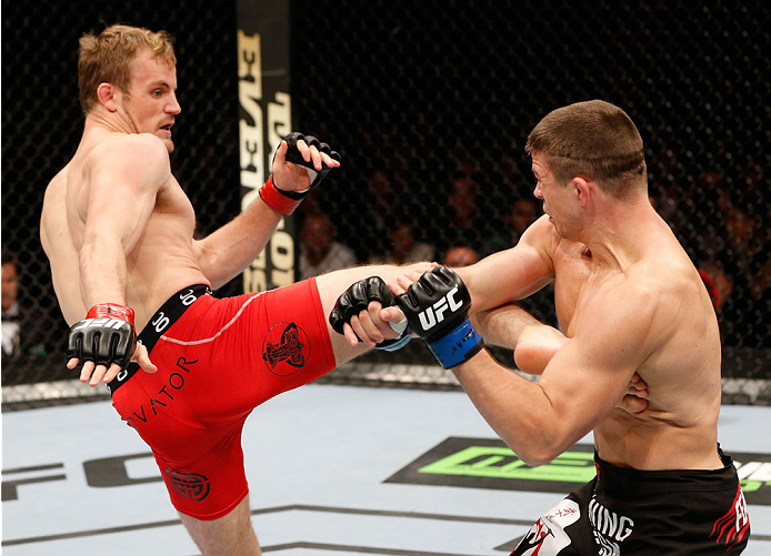 STOCKHOLM, SWEDEN - OCTOBER 04: (L-R) Gunnar Nelson of Iceland kicks Rick Story in their welterweight bout at the Ericsson Globe Arena on October 4, 2014 in Stockholm, Sweden. (Photo by Josh Hedges/Zuffa LLC/Zuffa LLC)