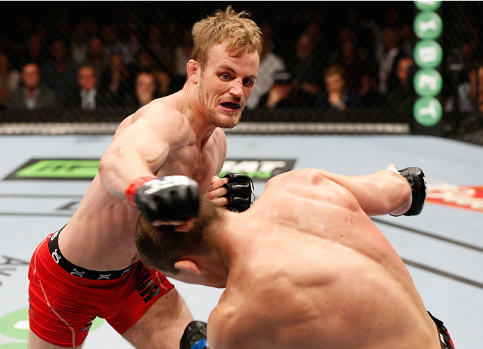 STOCKHOLM, SWEDEN - OCTOBER 04: (L-R) Gunnar Nelson of Iceland punches Rick Story in their welterweight bout at the Ericsson Globe Arena on October 4, 2014 in Stockholm, Sweden. (Photo by Josh Hedges/Zuffa LLC/Zuffa LLC)