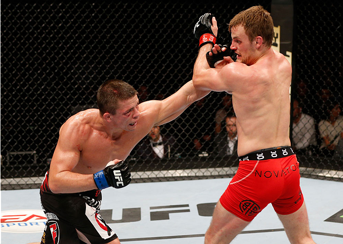 STOCKHOLM, SWEDEN - OCTOBER 04: (l-R) Rick Story punches Gunnar Nelson of Iceland in their welterweight bout at the Ericsson Globe Arena on October 4, 2014 in Stockholm, Sweden. (Photo by Josh Hedges/Zuffa LLC/Zuffa LLC)