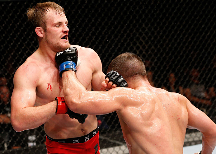 STOCKHOLM, SWEDEN - OCTOBER 04: (R-L) Rick Story punches Gunnar Nelson of Iceland in their welterweight bout at the Ericsson Globe Arena on October 4, 2014 in Stockholm, Sweden. (Photo by Josh Hedges/Zuffa LLC/Zuffa LLC)