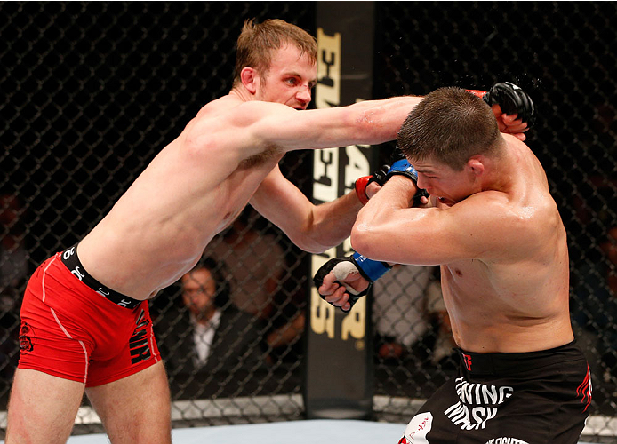 STOCKHOLM, SWEDEN - OCTOBER 04: (L-R) Gunnar Nelson of Iceland punches Rick Story in their welterweight bout at the Ericsson Globe Arena on October 4, 2014 in Stockholm, Sweden. (Photo by Josh Hedges/Zuffa LLC/Zuffa LLC)
