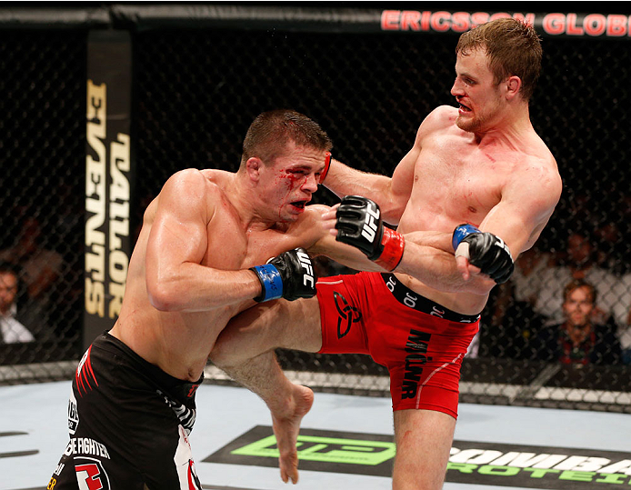 STOCKHOLM, SWEDEN - OCTOBER 04: (R-L) Gunnar Nelson of Iceland knees Rick Story in their welterweight bout at the Ericsson Globe Arena on October 4, 2014 in Stockholm, Sweden. (Photo by Josh Hedges/Zuffa LLC/Zuffa LLC)