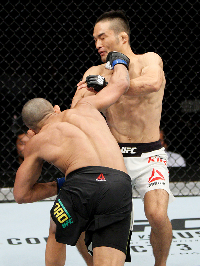 SAITAMA, JAPAN - SEPTEMBER 27: Diego Brandao of Brazil punches Katsunori Kikuno of Japan in their featherweight bout during the UFC event at the Saitama Super Arena on September 27, 2015 in Saitama, Japan. (Photo by Mitch Viquez/Zuffa LLC/Zuffa LLC via Ge