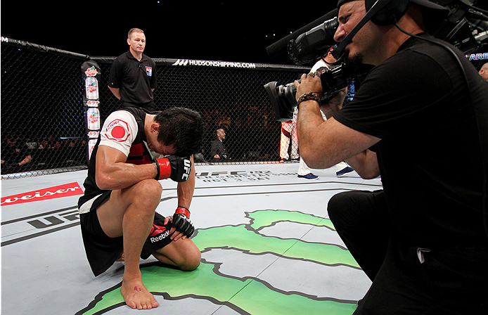 SAITAMA, JAPAN - SEPTEMBER 27: Takeya Mizugaki of Japan is emotional after his win over George Roop of the United States of America in their bantamweight bout during the UFC event at the Saitama Super Arena on September 27, 2015 in Saitama, Japan. (Photo