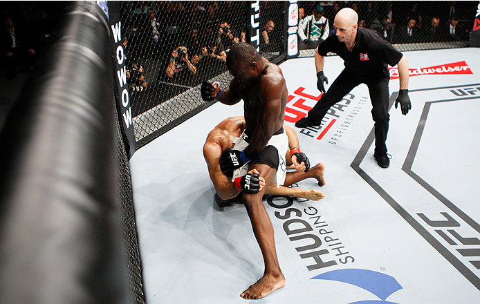 SAITAMA, JAPAN - SEPTEMBER 27: Uriah Hall of Jamaica punches Gegard Mousaasi of Iran in their middleweight bout during the UFC event at the Saitama Super Arena on September 27, 2015 in Saitama, Japan. (Photo by Mitch Viquez/Zuffa LLC/Zuffa LLC via Getty I