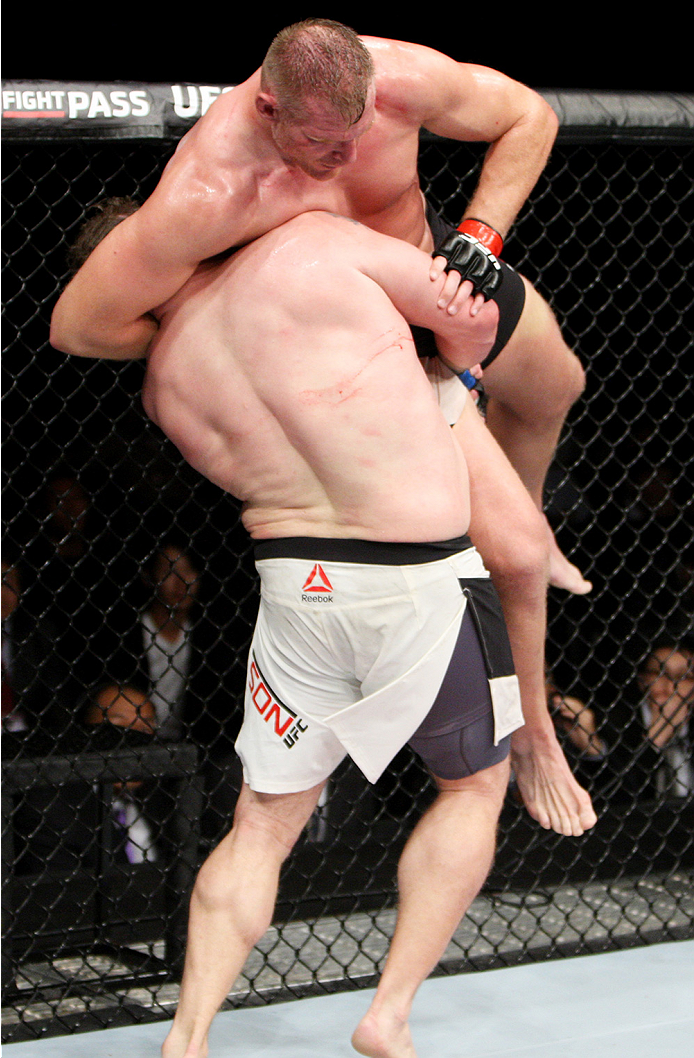 SAITAMA, JAPAN - SEPTEMBER 27: Roy Nelson of the United States of America looks for a takedown on Josh Barnett of the United States of America in their heavyweight bout during the UFC event at the Saitama Super Arena on September 27, 2015 in Saitama, Jap