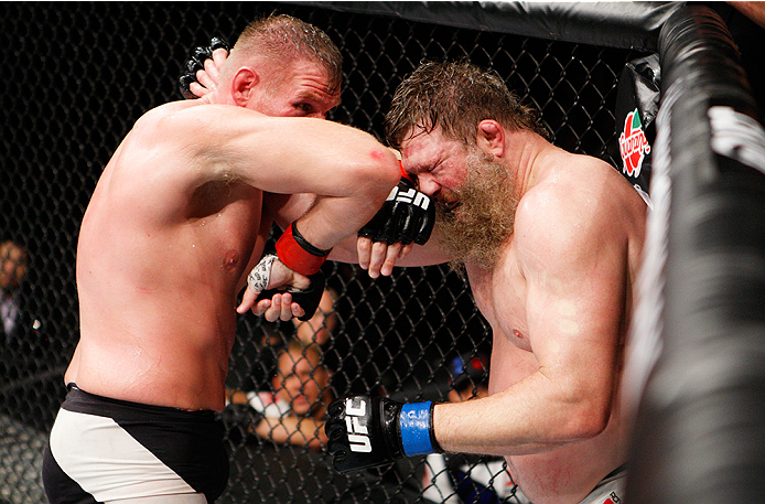 SAITAMA, JAPAN - SEPTEMBER 27: Josh Barnett of the United States of America throws and elbow at Roy Nelson of the United States of America in their heavyweight bout during the UFC event at the Saitama Super Arena on September 27, 2015 in Saitama, Japan.