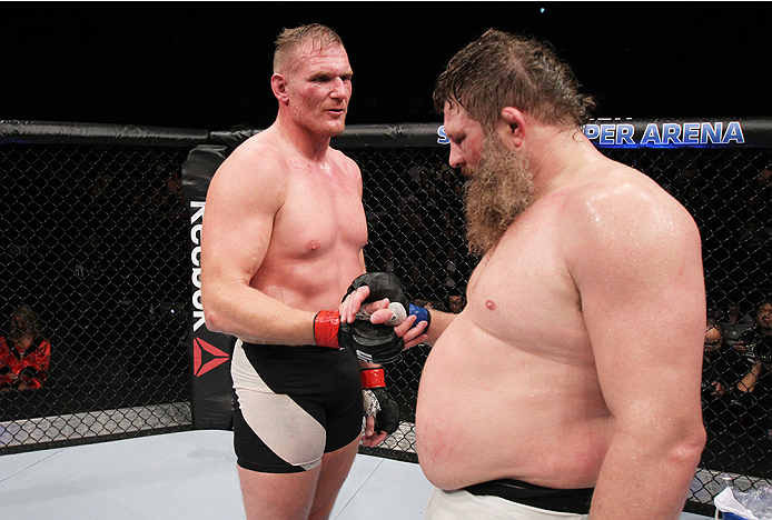 SAITAMA, JAPAN - SEPTEMBER 27: (From L to R) Josh Barnett of the United States of America and Roy Nelson of the United States of America shake hands after their heavyweight bout during the UFC event at the Saitama Super Arena on September 27, 2015 in Sait