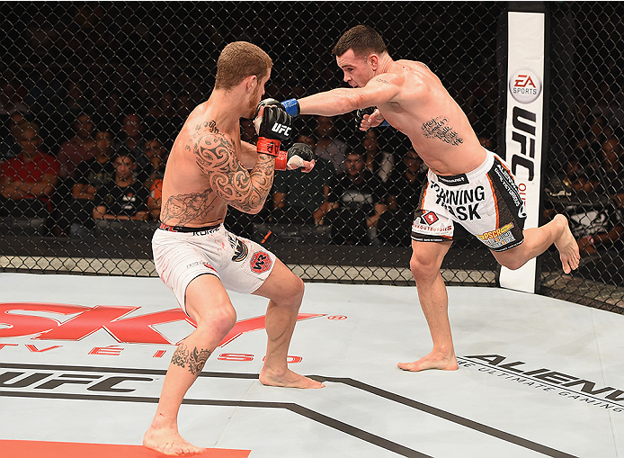 UBERLANDIA, BRAZIL - NOVEMBER 08: Colby Covington of the United States punches Wagner Silva of Brazil in their welterweight bout during the UFC Fight Night at Sabiazinho Gymnasium on November 8, 2014 in Uberlandia, Brazil. (Photo by Buda Mendes/Zuffa LLC/