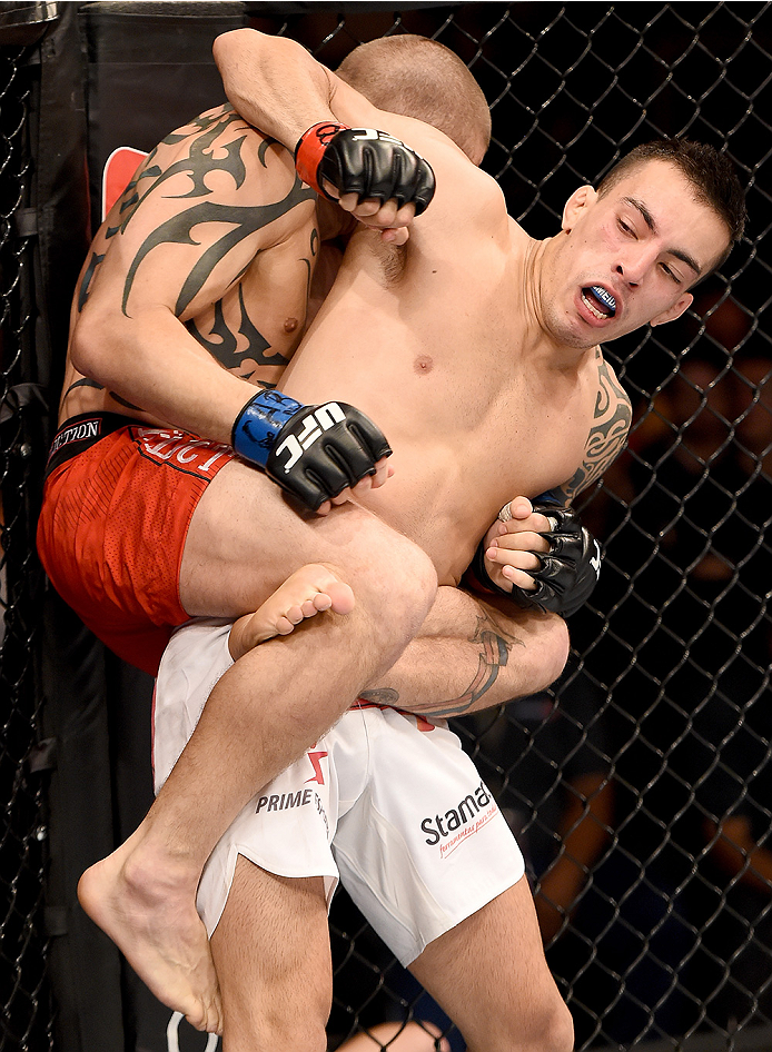 UBERLANDIA, BRAZIL - NOVEMBER 08: Thomas Almeida of Brazil and Tim Gorman of the United States in their bantanweight bout during the UFC Fight Night at Sabiazinho Gymnasium on November 8, 2014 in Uberlandia, Brazil. (Photo by Buda Mendes/Zuffa LLC/Zuff