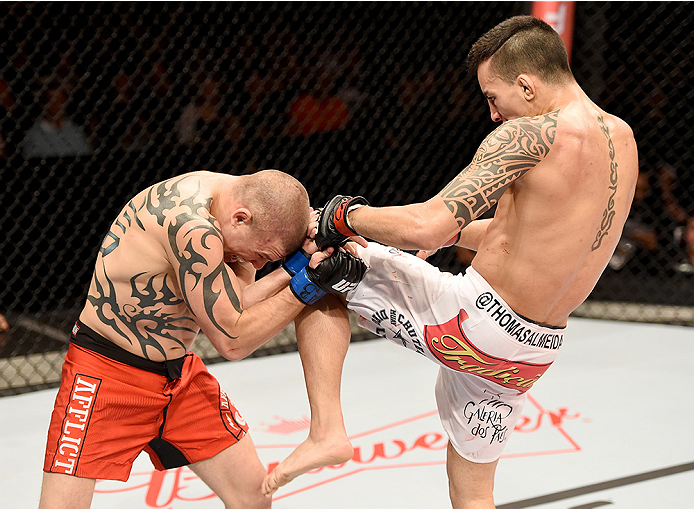 UBERLANDIA, BRAZIL - NOVEMBER 08: Thomas Almeida of Brazil kicks Tim Gorman of the United States in their bantanweight bout during the UFC Fight Night at Sabiazinho Gymnasium on November 8, 2014 in Uberlandia, Brazil. (Photo by Buda Mendes/Zuffa LLC/Zu