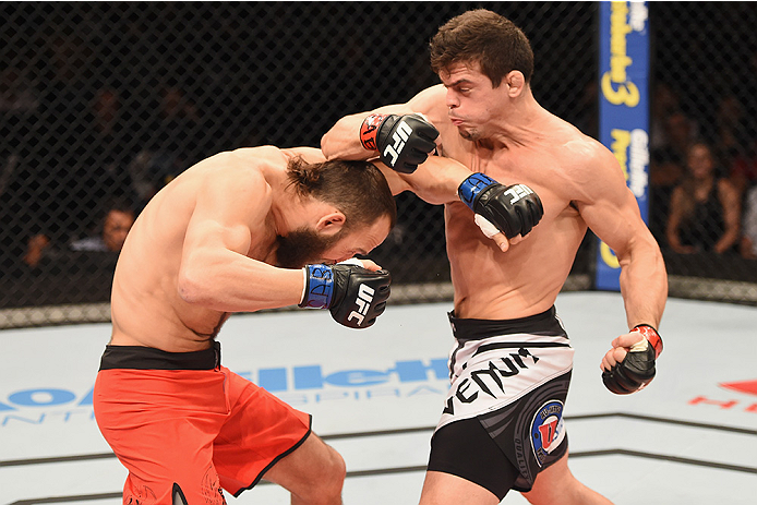 UBERLANDIA, BRAZIL - NOVEMBER 08: Caio Magalhaes of Brazil punches Trevor Smith of the United States in their middleweight bout during the UFC Fight Night at Sabiazinho Gymnasium> on November 8, 2014 in Uberlandia, Brazil. (Photo by Buda Mendes/Zuffa L