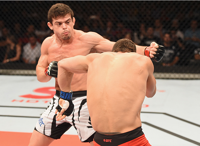 UBERLANDIA, BRAZIL - NOVEMBER 08: Caio Magalhaes of Brazil punches Trevor Smith of the United States in their middleweight bout during the UFC Fight Night at Sabiazinho Gymnasium> on November 8, 2014 in Uberlandia, Brazil. (Photo by Buda Mendes/Zuffa L
