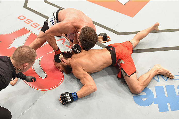 UBERLANDIA, BRAZIL - NOVEMBER 08: Caio Magalhaes of Brazil punches Trevor Smith of the United States in their middleweight bout during the UFC Fight Night at Sabiazinho Gymnasium> on November 8, 2014 in Uberlandia, Brazil. (Photo by Buda Mendes/Zuffa L