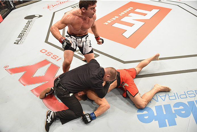 UBERLANDIA, BRAZIL - NOVEMBER 08: Caio Magalhaes celebrates after his victory over Trevor Smith of the United States in their middleweight bout during the UFC Fight Night at Sabiazinho Gymnasium on November 8, 2014 in Uberlandia, Brazil. (Photo by Buda
