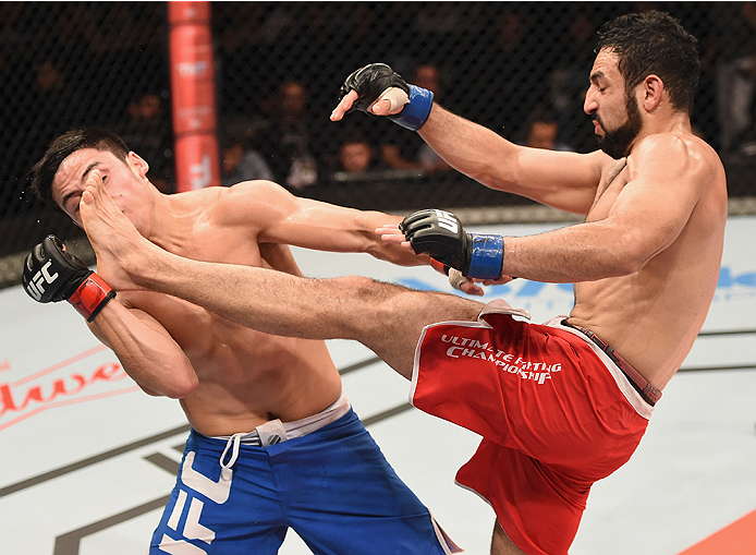 UBERLANDIA, BRAZIL - NOVEMBER 08: Rodolfo Rubio of Mexico kicks Diego Rivas of Chile in their featherweight bout during the UFC Fight Night at Sabiazinho Gymnasium on November 8, 2014 in Uberlandia, Brazil. (Photo by Buda Mendes/Zuffa LLC/Zuffa LLC via