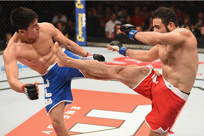 UBERLANDIA, BRAZIL - NOVEMBER 08: Rodolfo Rubio of Mexico kicks Diego Rivas of Chile in their featherweight bout during the UFC Fight Night at Sabiazinho Gymnasium on November 8, 2014 in Uberlandia, Brazil. (Photo by Buda Mendes/Zuffa LLC/Zuffa LLC via