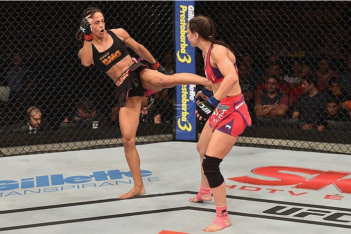 UBERLANDIA, BRAZIL - NOVEMBER 08: Juliana Lima of Brazil kicks Nina Ansaroff of the United States in their strawweight bout during the UFC Fight Night at Sabiazinho Gymnasium on November 8, 2014 in Uberlandia, Brazil. (Photo by Buda Mendes/Zuffa LLC/Zuf