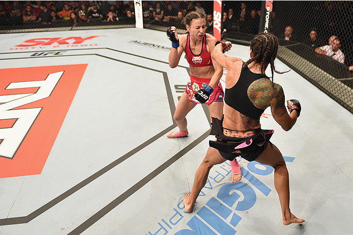 UBERLANDIA, BRAZIL - NOVEMBER 08: Juliana Lima of Brazil punches Nina Ansaroff of the United States in their strawweight bout during the UFC Fight Night at Sabiazinho Gymnasium on November 8, 2014 in Uberlandia, Brazil. (Photo by Buda Mendes/Zuffa LLC/Z