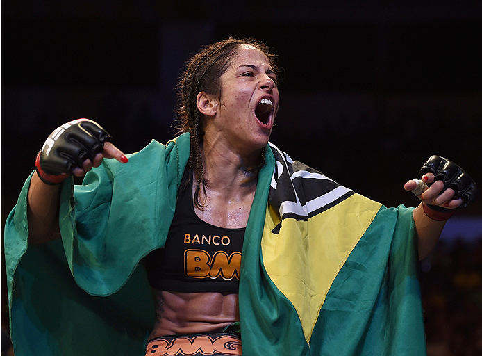 UBERLANDIA, BRAZIL - NOVEMBER 08: Juliana Lima of Brazil celebrates after her victory over Nina Ansaroff of the United States in their strawweight bout during the UFC Fight Night at Sabiazinho Gymnasium on November 8, 2014 in Uberlandia, Brazil. (Photo