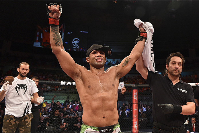 UBERLANDIA, BRAZIL - NOVEMBER 08: Claudio Silva of Brazil celebrates after his victory over Leon Edwards of England in their welterweight bout during the UFC Fight Night at Sabiazinho Gymnasium on November 8, 2014 in Uberlandia, Brazil. (Photo by Buda M