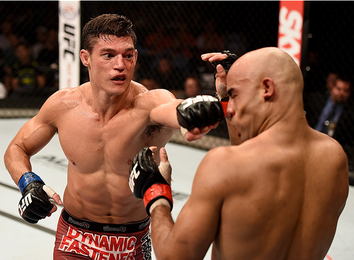 UBERLANDIA, BRAZIL - NOVEMBER 08: Warlley Alves of Brazil punches Alan Jouban of the United States in their welterweight bout during the UFC Fight Night at Sabiazinho Gymnasium on November 8, 2014 in Uberlandia, Brazil. (Photo by Buda Mendes/Zuffa LLC/