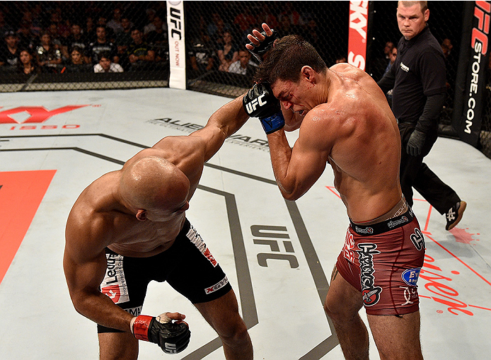 UBERLANDIA, BRAZIL - NOVEMBER 08: Alan Jouban of the United States punches Warlley Alves of Brazil in their welterweight bout during the UFC Fight Night at Sabiazinho Gymnasium on November 8, 2014 in Uberlandia, Brazil. (Photo by Buda Mendes/Zuffa LLC/Z