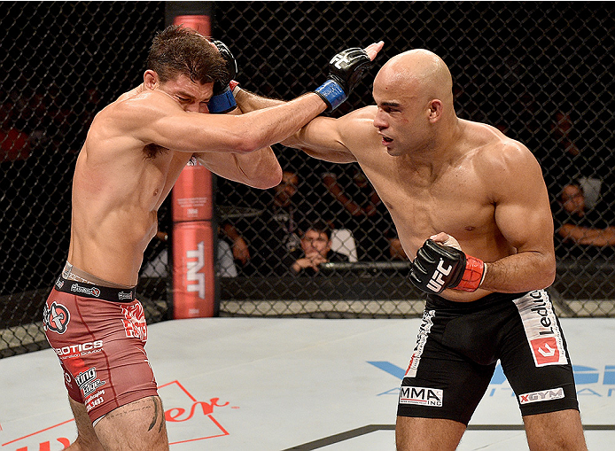 UBERLANDIA, BRAZIL - NOVEMBER 08: Alan Jouban of the United States punches Warlley Alves of Brazil in their welterweight bout during the UFC Fight Night at Sabiazinho Gymnasium on November 8, 2014 in Uberlandia, Brazil. (Photo by Buda Mendes/Zuffa LLC/Z