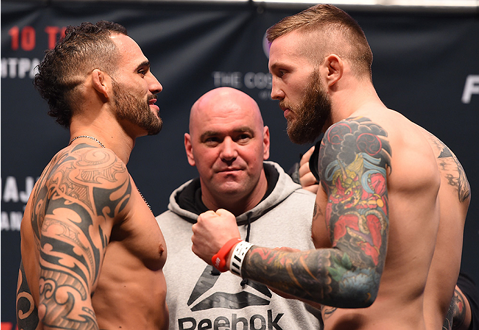 LAS VEGAS, NV - DECEMBER 09: (L-R) Opponents Santiago Ponzinibbio of Argentina and Andreas Stahl of Sweden face off during the UFC Fight Night weigh-in inside MGM Grand Garden Arena on December 9, 2015 in Las Vegas, Nevada. (Photo by Josh Hedges/Zuffa L