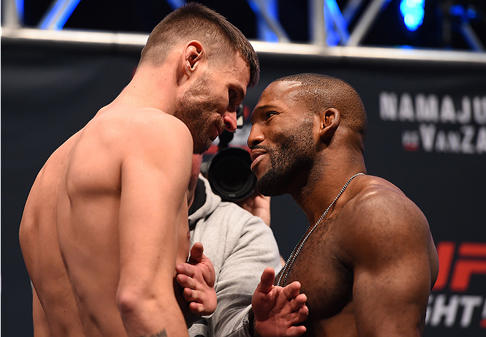 LAS VEGAS, NV - DECEMBER 09: (L-R) Opponents Tim Means and John Howard face off during the UFC Fight Night weigh-in inside MGM Grand Garden Arena on December 9, 2015 in Las Vegas, Nevada. (Photo by Josh Hedges/Zuffa LLC/Zuffa LLC via Getty Images)