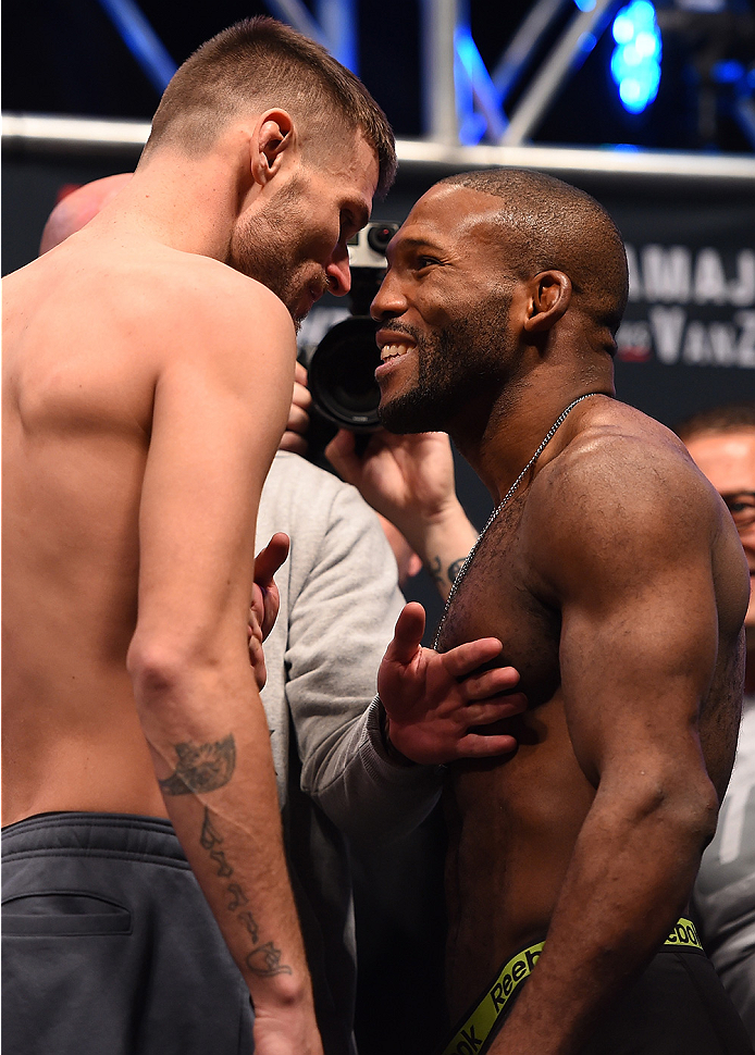 LAS VEGAS, NV - DECEMBER 09: (L-R) Opponents Tim Means and John Howard face off during the UFC Fight Night weigh-in inside MGM Grand Garden Arena on December 9, 2015 in Las Vegas, Nevada. (Photo by Josh Hedges/Zuffa LLC/Zuffa LLC via Getty Images)